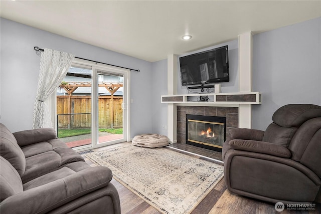 27772 213th Ct SE, Maple Valley, WA 98038 - living room featuring a fireplace, recessed lighting, and wood finished floors