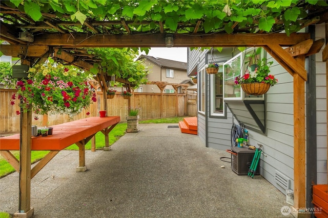 27772 213th Ct SE, Maple Valley, WA 98038 - fenced backyard with a patio