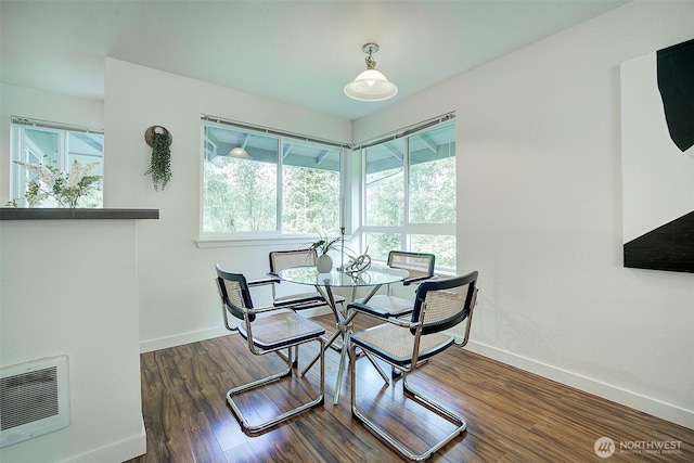 12019 NE 204th Pl Unit D303, Bothell, WA 98011 - dining area featuring baseboards and wood finished floors
