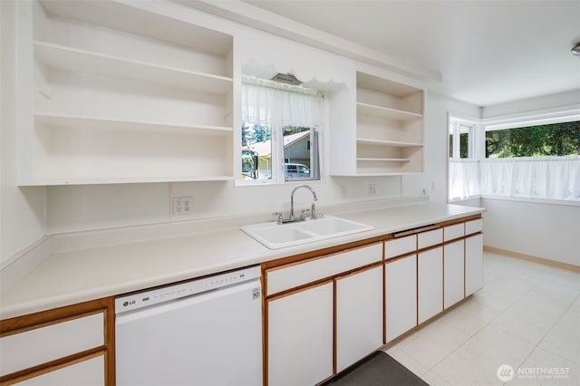 11319 86th Ave E, Puyallup, WA 98373 - kitchen with open shelves, dishwasher, a sink, light countertops, and white cabinetry