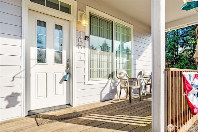 152 N Oar Loop NW, Ocean Shores, WA 98569 - entrance to property with a porch