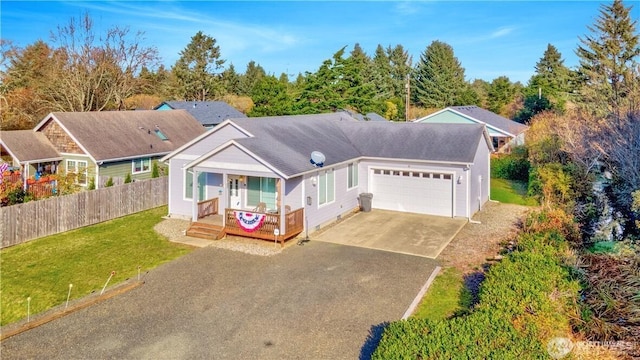 152 N Oar Loop NW, Ocean Shores, WA 98569 - view of front facade with a garage and asphalt driveway