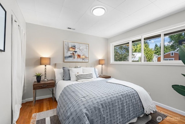 8414 34th Ave SW, Seattle, WA 98126 - bedroom with wood finished floors and baseboards
