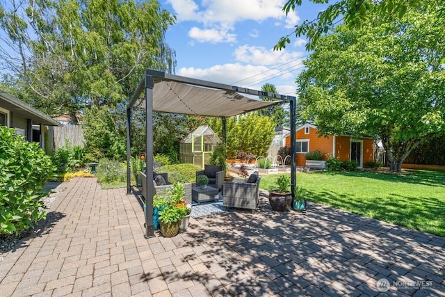 8414 34th Ave SW, Seattle, WA 98126 - view of patio / terrace with an exterior structure and an outbuilding