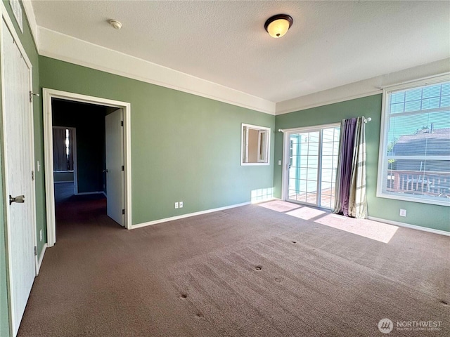 173 Steelhead Dr, Silver Creek, WA 98585 - carpeted empty room featuring baseboards, a smoke detector, and a textured ceiling