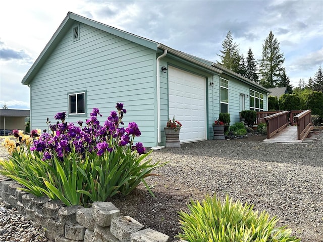 173 Steelhead Dr, Silver Creek, WA 98585 - view of property exterior with an attached garage and driveway