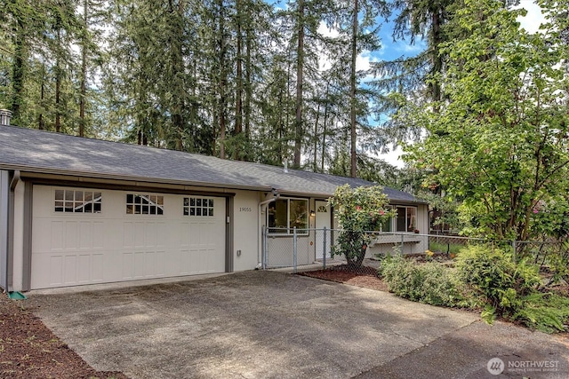 19055 SE 269th St, Covington, WA 98042 - ranch-style house with asphalt driveway, an attached garage, and stucco siding