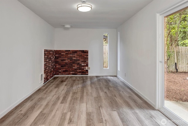 19055 SE 269th St, Covington, WA 98042 - spare room featuring wood finished floors and baseboards