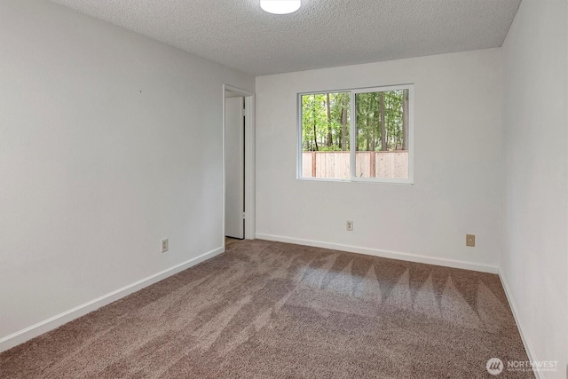19055 SE 269th St, Covington, WA 98042 - carpeted empty room with a textured ceiling and baseboards