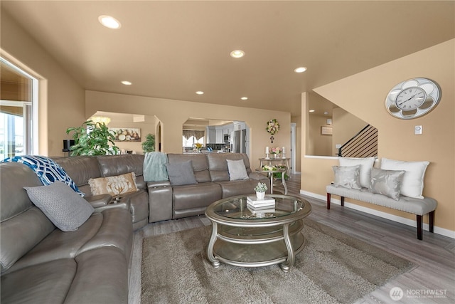 11031 Cornell Ave S, Seattle, WA 98178 - living area with arched walkways, wood finished floors, recessed lighting, and baseboards