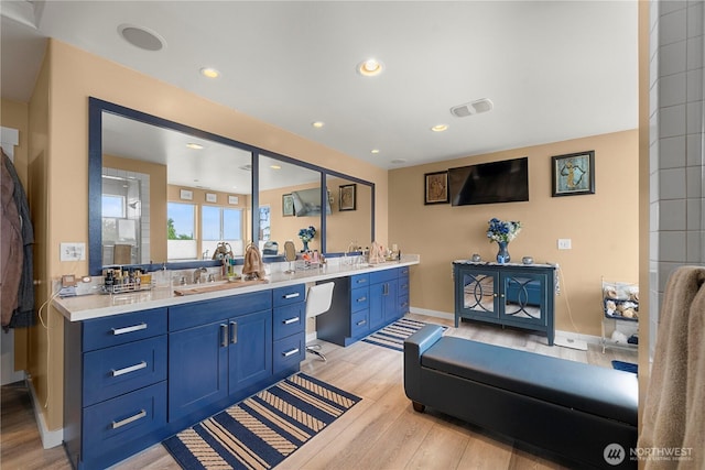 11031 Cornell Ave S, Seattle, WA 98178 - full bathroom with wood finished floors, vanity, baseboards, and recessed lighting