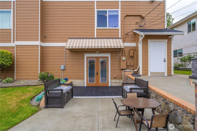 11031 Cornell Ave S, Seattle, WA 98178 - rear view of house featuring french doors and a patio