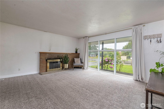 8718 Hipkins Rd SW, Lakewood, WA 98498 - unfurnished living room with carpet floors and a fireplace