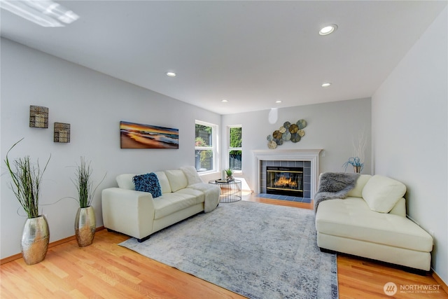14531 86th Pl NE, Kenmore, WA 98028 - living area with a tiled fireplace, wood finished floors, and recessed lighting