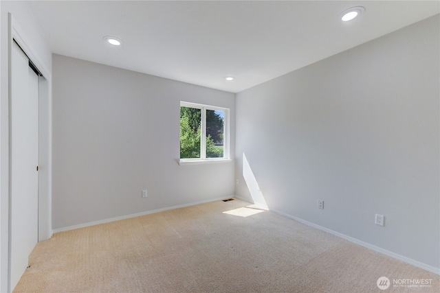 14531 86th Pl NE, Kenmore, WA 98028 - unfurnished bedroom featuring carpet, recessed lighting, and a closet