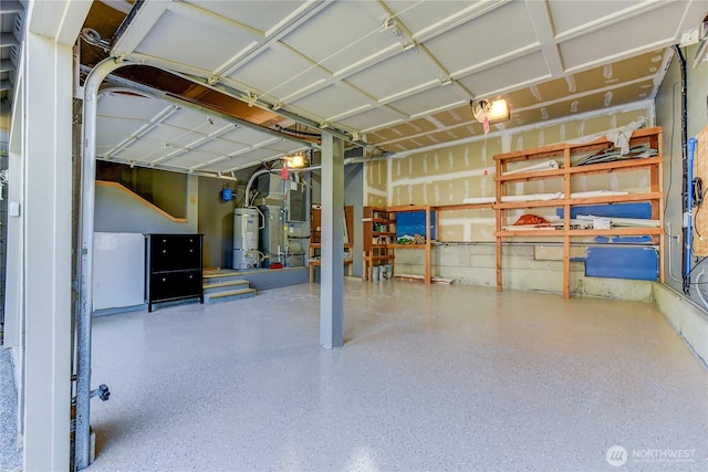 14531 86th Pl NE, Kenmore, WA 98028 - below grade area with strapped water heater, a garage, and heating unit