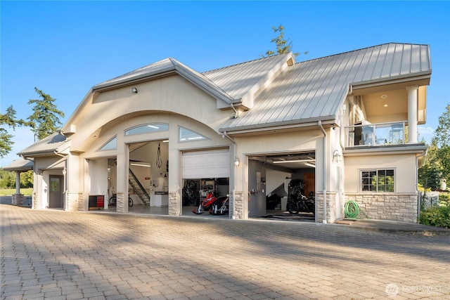 33020 84th Ave NW, Stanwood, WA 98292 - view of building exterior featuring decorative driveway and an attached garage