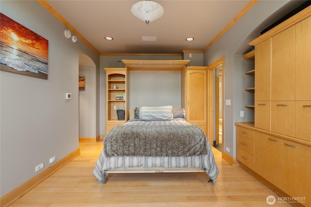 33020 84th Ave NW, Stanwood, WA 98292 - bedroom with ornamental molding, arched walkways, light wood-type flooring, baseboards, and recessed lighting