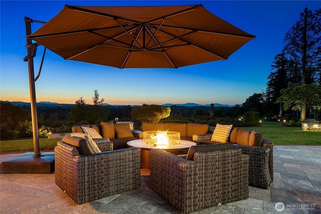 33020 84th Ave NW, Stanwood, WA 98292 - view of patio / terrace featuring an outdoor living space with a fire pit and a mountain view