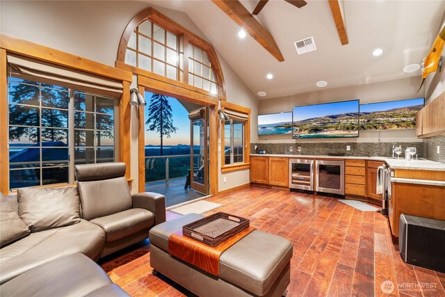 33020 84th Ave NW, Stanwood, WA 98292 - living room featuring wine cooler, a ceiling fan, high vaulted ceiling, recessed lighting, and beam ceiling