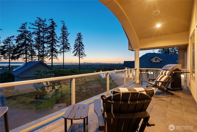 33020 84th Ave NW, Stanwood, WA 98292 - patio terrace at dusk with a balcony and area for grilling