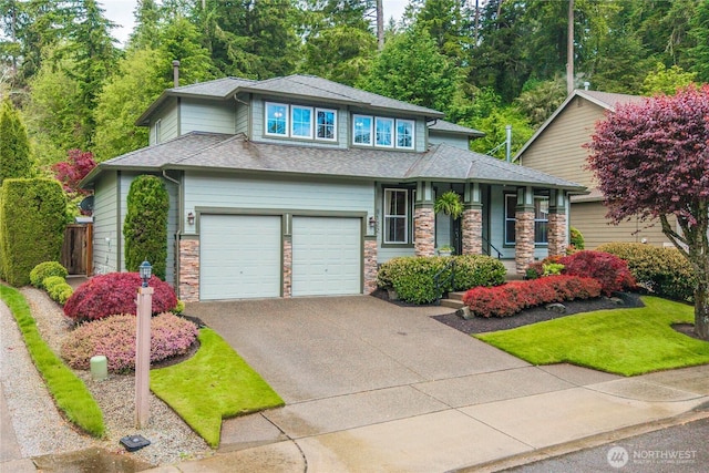8122 104th Street Ct SW, Lakewood, WA 98498 - prairie-style home featuring driveway, stone siding, and roof with shingles