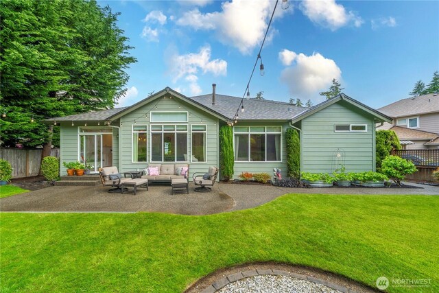 8122 104th Street Ct SW, Lakewood, WA 98498 - back of house featuring an outdoor hangout area, a patio, and roof with shingles