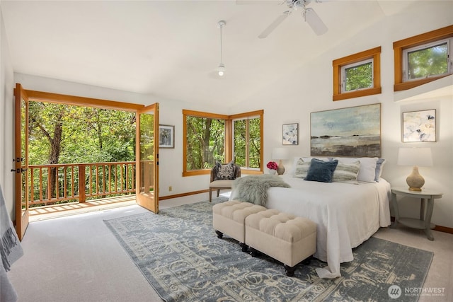 14427 Silven Ave NE, Bainbridge Island, WA 98110 - carpeted bedroom with access to outside, baseboards, ceiling fan, and high vaulted ceiling