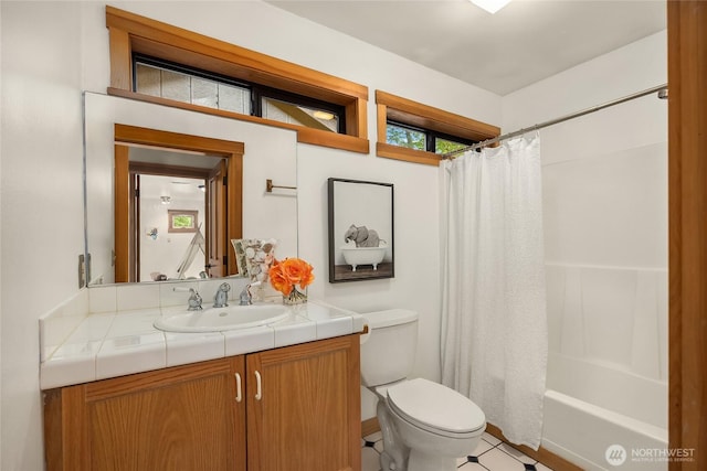 14427 Silven Ave NE, Bainbridge Island, WA 98110 - full bath with vanity, toilet, and shower / tub combo