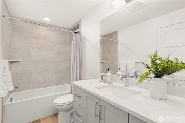 1206C NW 83rd St, Seattle, WA 98117 - bathroom featuring vanity, shower / bathtub combination with curtain, toilet, and wood finished floors