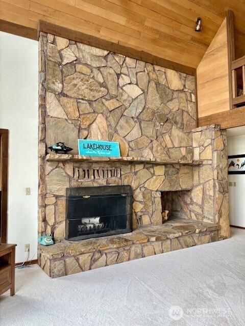 56 Westlake Rd, Oroville, WA 98844 - detailed view of wood ceiling, carpet flooring, a fireplace, and baseboards