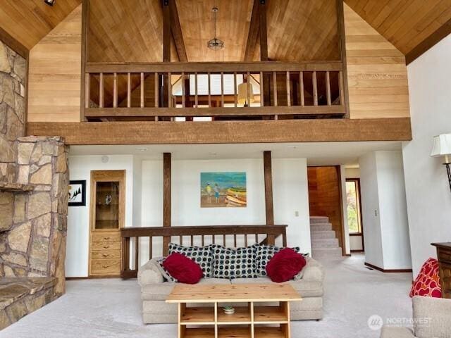 56 Westlake Rd, Oroville, WA 98844 - carpeted living area with wood ceiling, high vaulted ceiling, and stairs