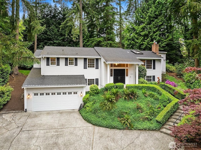12810 NE 32nd Pl, Bellevue, WA 98005 - view of front of house with driveway and a garage