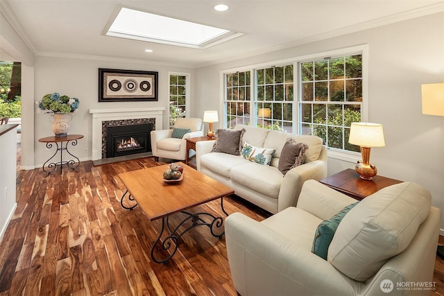 12810 NE 32nd Pl, Bellevue, WA 98005 - living room with ornamental molding, a skylight, wood finished floors, a fireplace with flush hearth, and recessed lighting