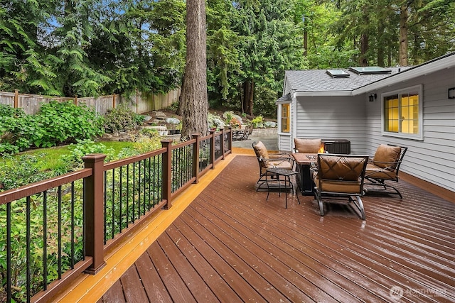 12810 NE 32nd Pl, Bellevue, WA 98005 - deck featuring outdoor dining space and a fenced backyard