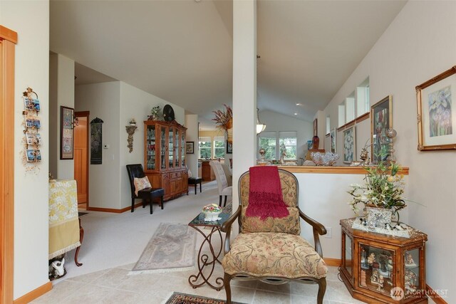 1770 SW Aberdeen Ct, Oak Harbor, WA 98277 - living area with vaulted ceiling, baseboards, and carpet