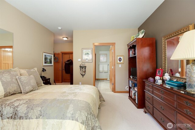 1770 SW Aberdeen Ct, Oak Harbor, WA 98277 - bedroom with light carpet and ensuite bath