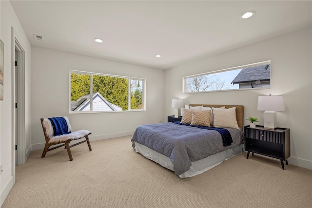 6730 21st Ave SW, Seattle, WA 98106 - bedroom with light colored carpet, baseboards, and recessed lighting