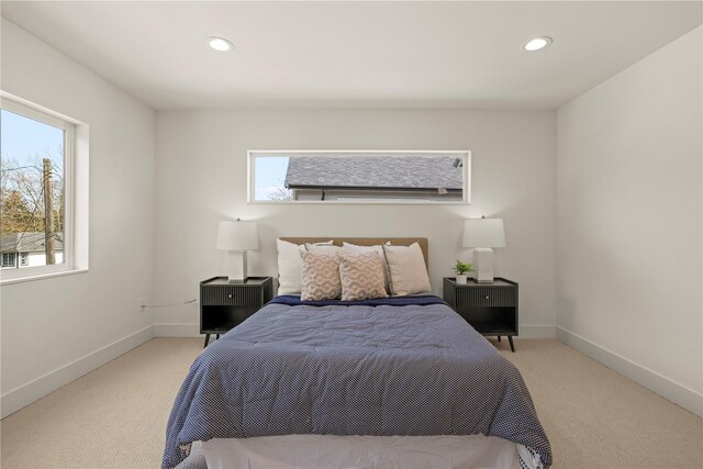 6730 21st Ave SW, Seattle, WA 98106 - bedroom with light colored carpet, recessed lighting, and baseboards