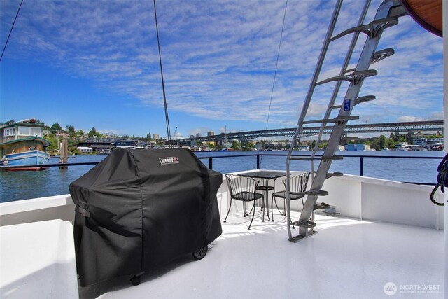 2401 N Northlake Way Unit B13, Seattle, WA 98103 - view of patio / terrace featuring area for grilling and a water view
