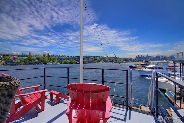 2401 N Northlake Way Unit B13, Seattle, WA 98103 - dock area with a balcony, a water view, and a view of city