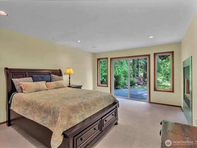 44611 SE 72nd St, Snoqualmie, WA 98065 - bedroom with access to outside, light colored carpet, baseboards, and recessed lighting