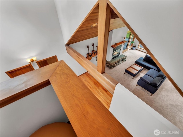 44611 SE 72nd St, Snoqualmie, WA 98065 - stairs with carpet flooring and a glass covered fireplace