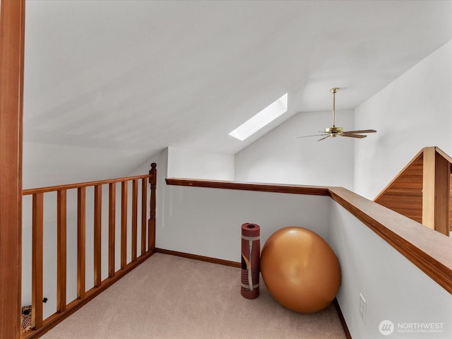 44611 SE 72nd St, Snoqualmie, WA 98065 - corridor featuring a skylight, vaulted ceiling, and carpet flooring