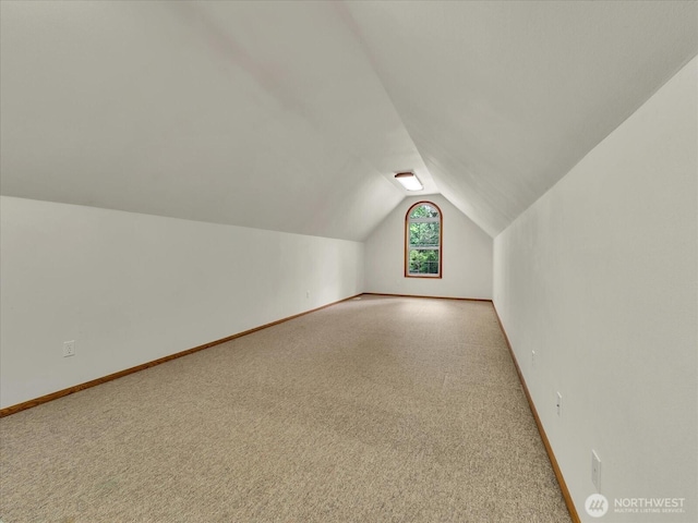44611 SE 72nd St, Snoqualmie, WA 98065 - bonus room with lofted ceiling, carpet floors, and baseboards