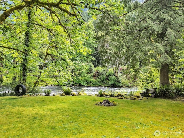 44611 SE 72nd St, Snoqualmie, WA 98065 - view of grassy yard featuring a wooded view