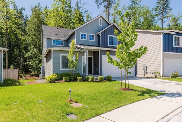 9422 Fairhaven Cir NE, Bremerton, WA 98311 - view of front facade featuring board and batten siding, driveway, and a garage