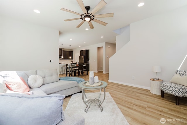 9422 Fairhaven Cir NE, Bremerton, WA 98311 - living room with light wood-type flooring, ceiling fan, baseboards, and recessed lighting