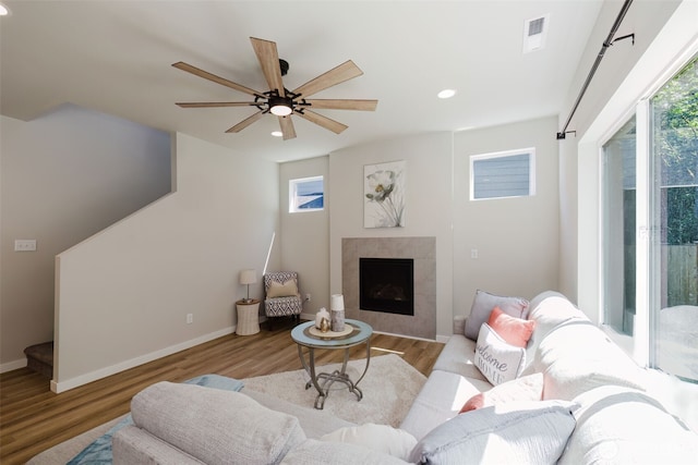 9422 Fairhaven Cir NE, Bremerton, WA 98311 - living room featuring wood finished floors, recessed lighting, a fireplace, ceiling fan, and baseboards