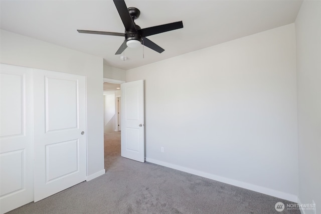 9422 Fairhaven Cir NE, Bremerton, WA 98311 - unfurnished bedroom with carpet flooring, baseboards, and a ceiling fan